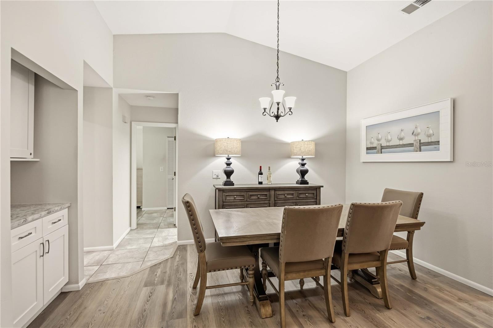 Dining area with built in cabinets, dry bar, buffet