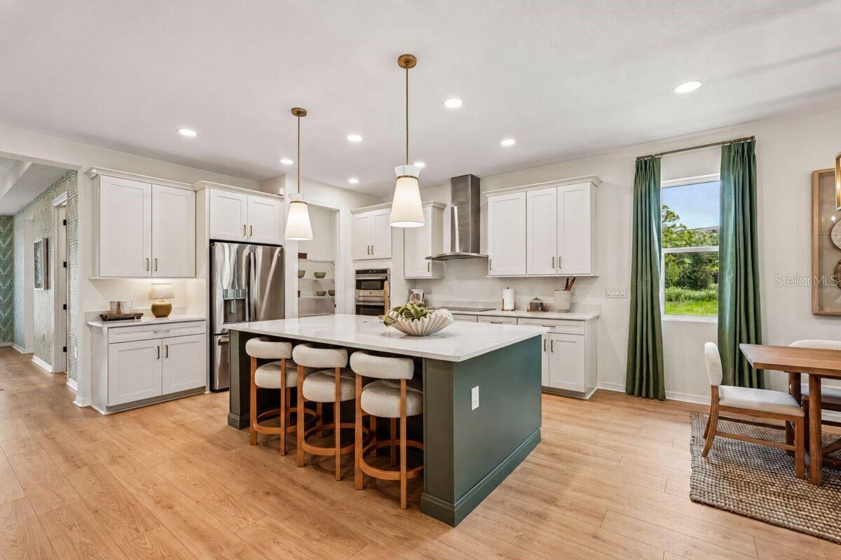 Kitchen-Photo description represents the model home of same floor plan.