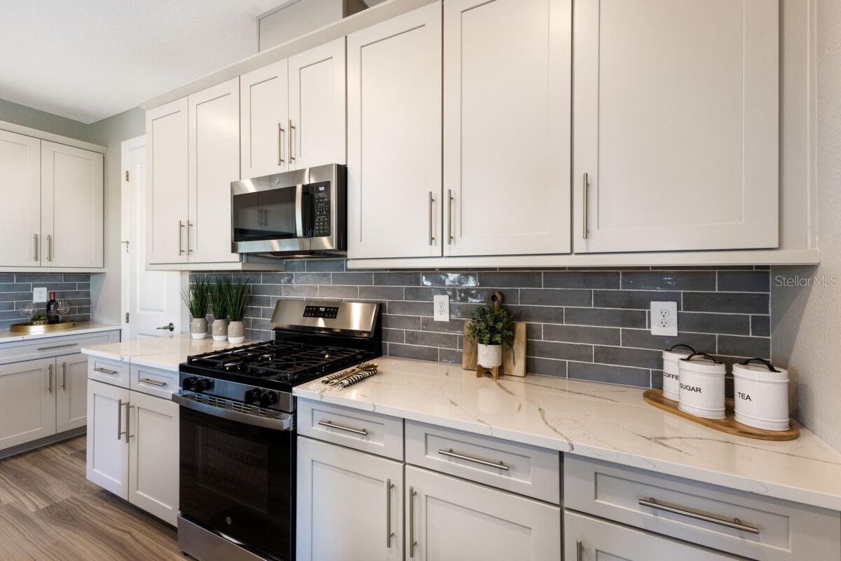 Kitchen-Photo description represents the model home of same floor plan.