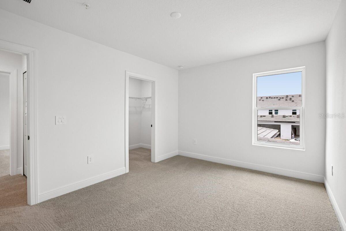 Bedroom 2-Photo description represents the model home of same floor plan.