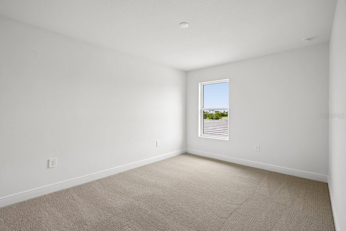Bedroom 3-Photo description represents the model home of same floor plan.