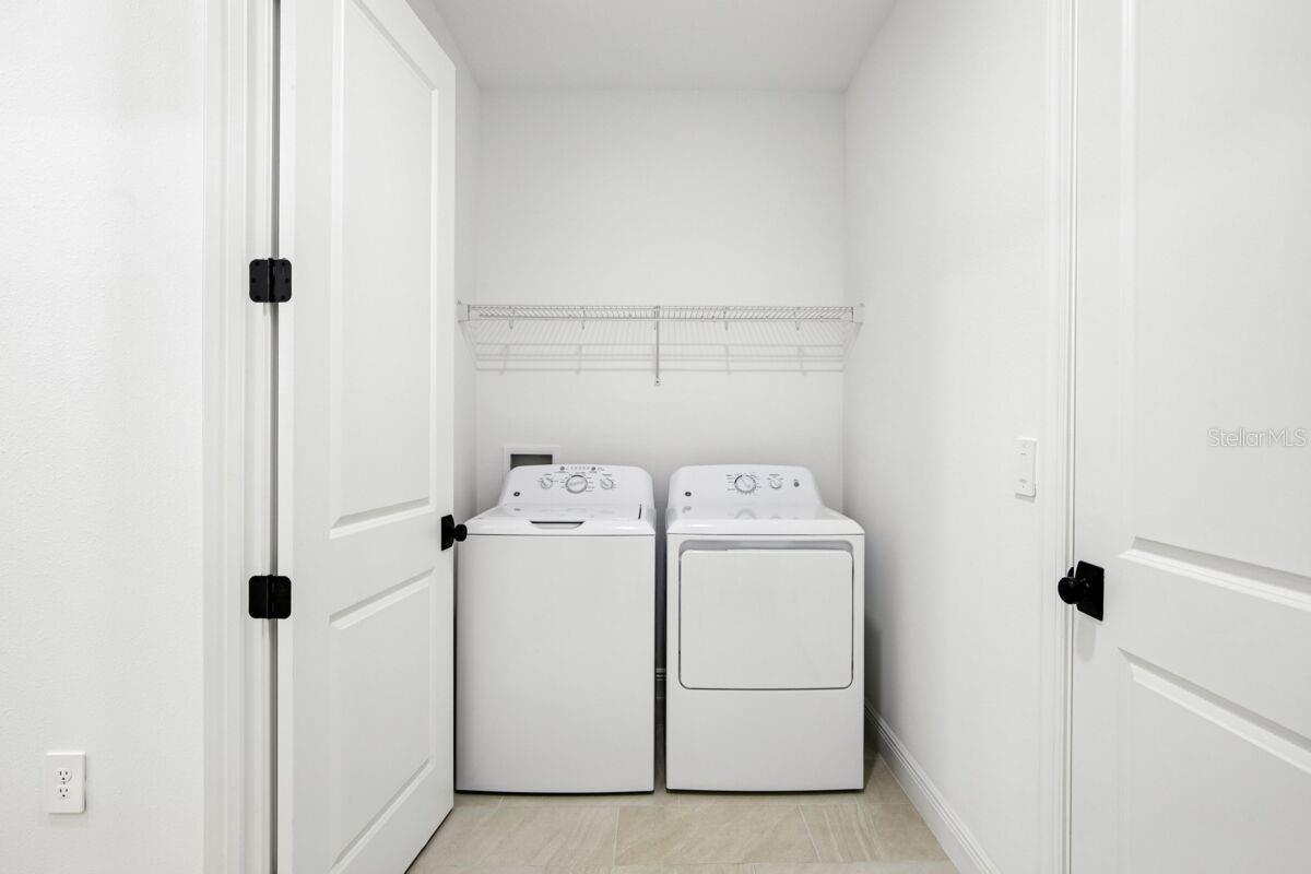 Laundry-Photo description represents the model home of same floor plan.