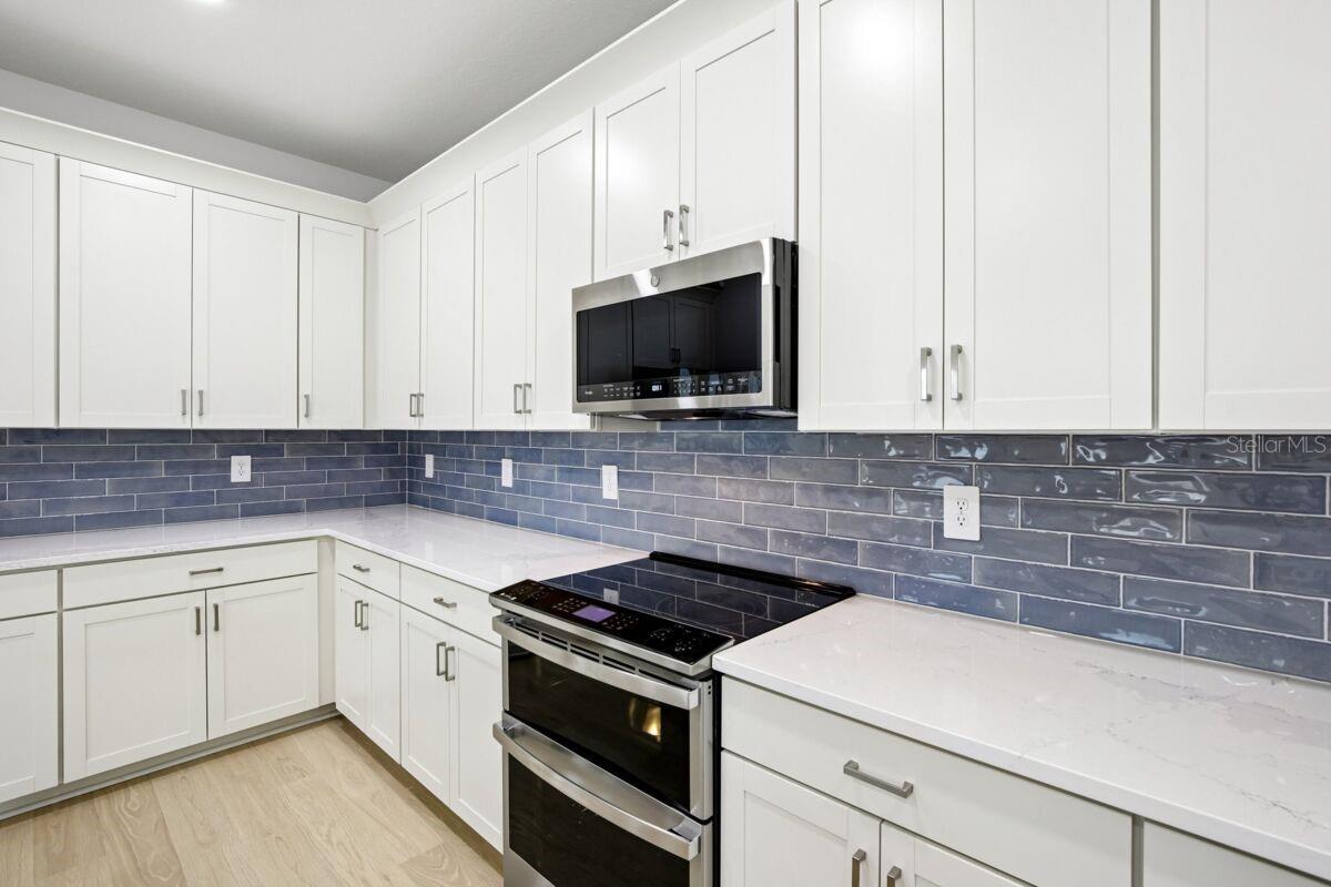 Kitchen-Photo description represents the model home of same floor plan.