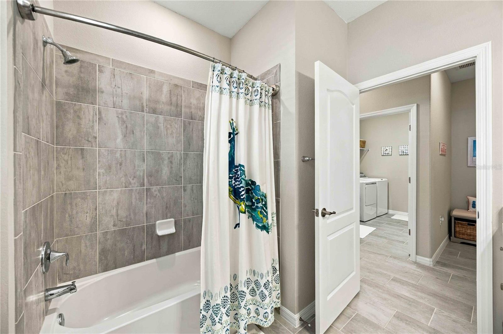 The guest bath is large, welcoming to guests and easy to manuever in with a tub/shower combination.